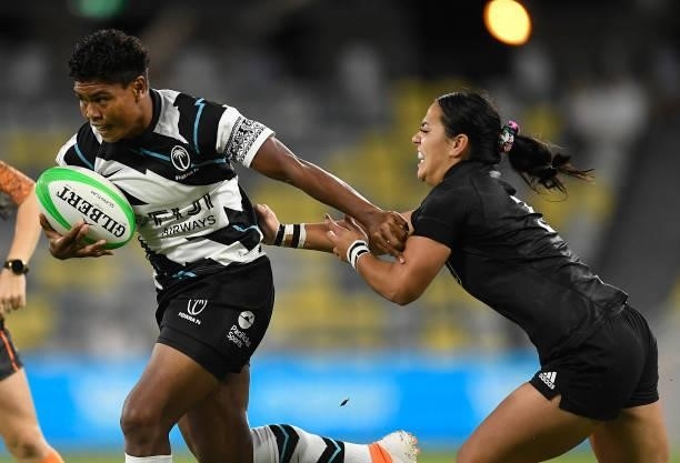Rusila Nagasau of Fiji is tackled during the Oceania Sevens Challenge match between New Zealand and Fiji at Queensland Country Bank Stadium on June...