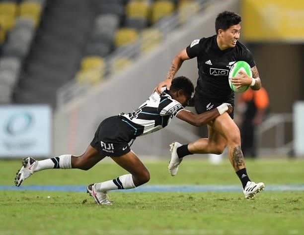 Gayle Broughton of New Zealand is tackled by Reapi Ulunasau of Fiji during the Oceania Sevens Challenge match between New Zealand and Fiji at...