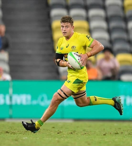 Nick Malouf of Australia runs the ball during the Oceania Sevens Challenge match between New Zealand and Australia at Queensland Country Bank Stadium...