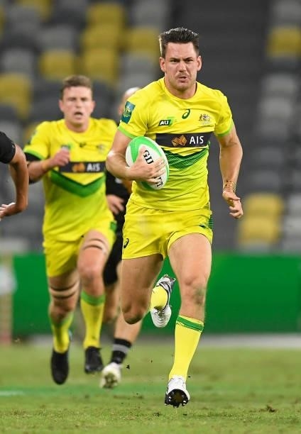 Lachlan Anderson of Australia runs to score a try during the Oceania Sevens Challenge match between New Zealand and Australia at Queensland Country...