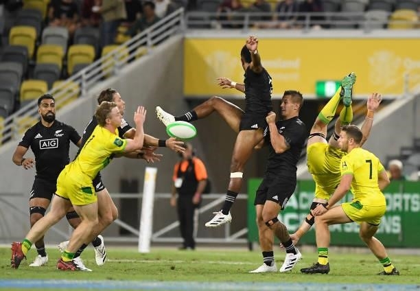 Akuila Rokolisoa of New Zealand and Nick Malouf of Australia contest the ball during the Oceania Sevens Challenge match between New Zealand and...