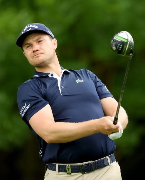 Oliver Fisher of England on the 13th tee during the second round of The BMW International Open at Golfclub Munchen Eichenried on June 25, 2021 in...