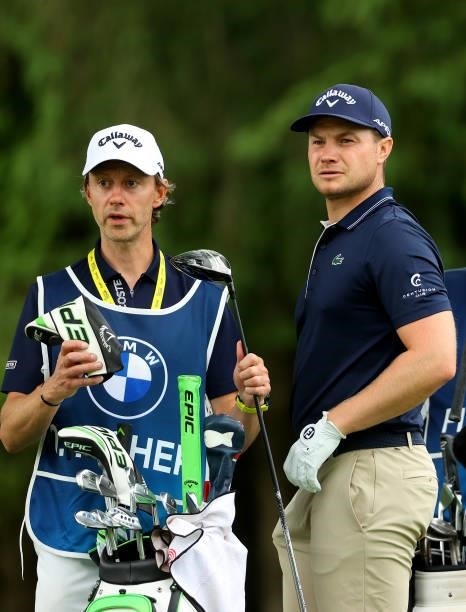 Oliver Fisher of England and his caddie on the 13th tee during the second round of The BMW International Open at Golfclub Munchen Eichenried on June...