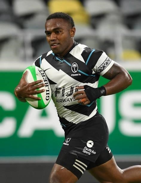Waisea Nacuqu of Fiji runs to score a try during the Oceania Sevens Challenge match between Fiji and Oceania at Queensland Country Bank Stadium on...
