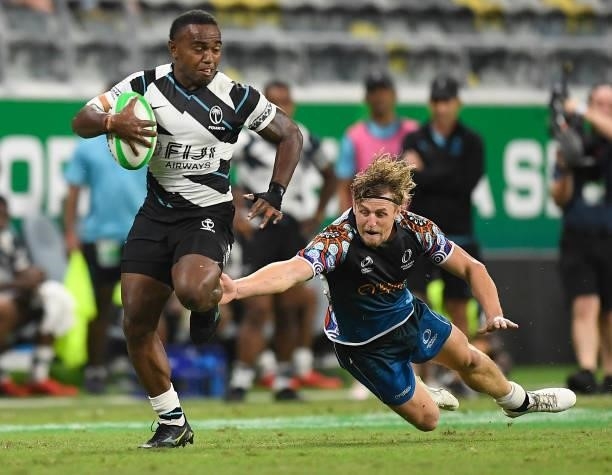 Waisea Nacuqu of Fiji makes a break during the Oceania Sevens Challenge match between Fiji and Oceania at Queensland Country Bank Stadium on June 25,...