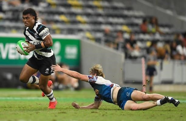 Taniela Sadrugu of Fiji runs the ball during the Oceania Sevens Challenge match between Fiji and Oceania at Queensland Country Bank Stadium on June...