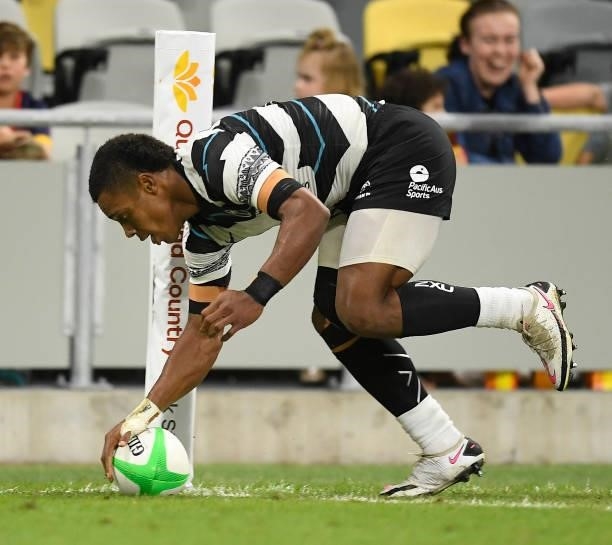 Napolioni Bolaca of Fiji scores a try during the Oceania Sevens Challenge match between Fiji and Oceania at Queensland Country Bank Stadium on June...