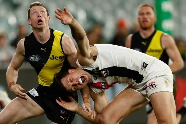 Dylan Grimes of the Tigers and Rowan Marshall of the Saints compete during the round 15 AFL match between the Richmond Tigers and the St Kilda Saints...
