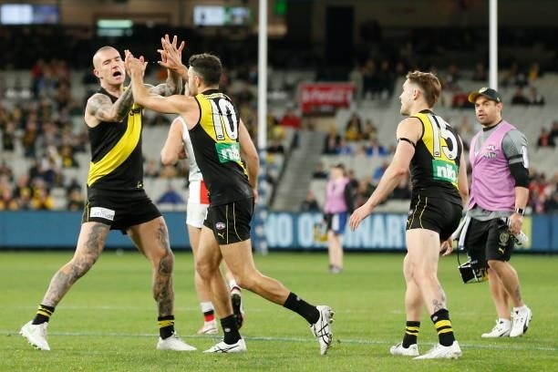 Shane Edwards of the Tigers celebrates a goal during the round 15 AFL match between the Richmond Tigers and the St Kilda Saints at Melbourne Cricket...