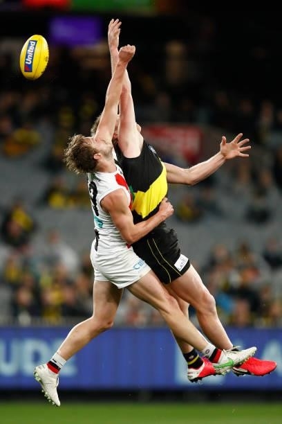 Jimmy Webster of the Saints and Jack Riewoldt of the Tigers compete during the round 15 AFL match between the Richmond Tigers and the St Kilda Saints...