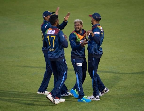 Wanindu Hasaranga of Sri Lanka celebrates with team mates after taking the wicket of Jason Roy of England during the 2nd T20I between England and Sri...