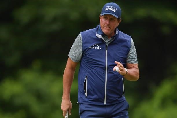 Phil Mickelson of the United States reacts on the 14th green during the second round of the Travelers Championship at TPC River Highlands on June 25,...