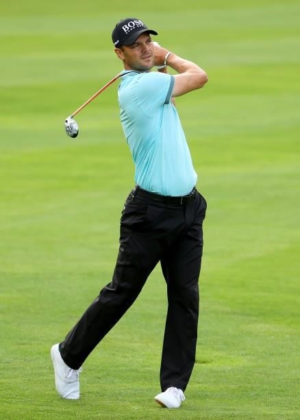 Martin Kaymer of Germany plays his second shot on the 18th hole during the second round of The BMW International Open at Golfclub Munchen Eichenried...