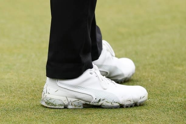 Detail of Rickie Fowler of the United States Puma shoes during the second round of the Travelers Championship at TPC River Highlands on June 25, 2021...