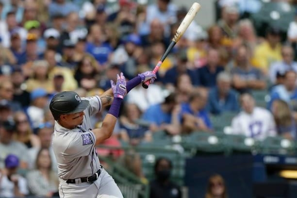 Yonathan Daza of the Colorado Rockies singles in a run in the sixth inning against the Milwaukee Brewers at American Family Field on June 25, 2021 in...