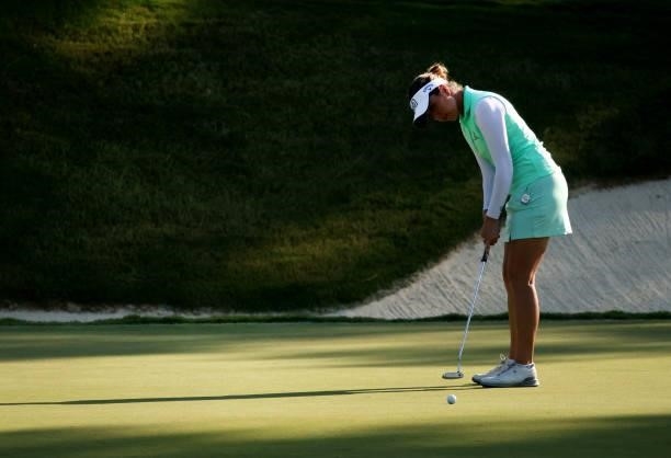 Georgia Hall of England putts on the ninth green during the second round of the KPMG Women's PGA Championship at Atlanta Athletic Club on June 25,...