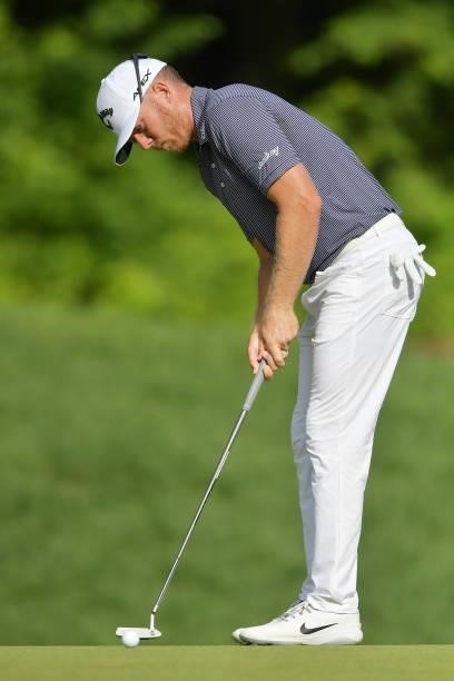 Talor Gooch of the United States putts on the 14th green during the second round of the Travelers Championship at TPC River Highlands on June 25,...