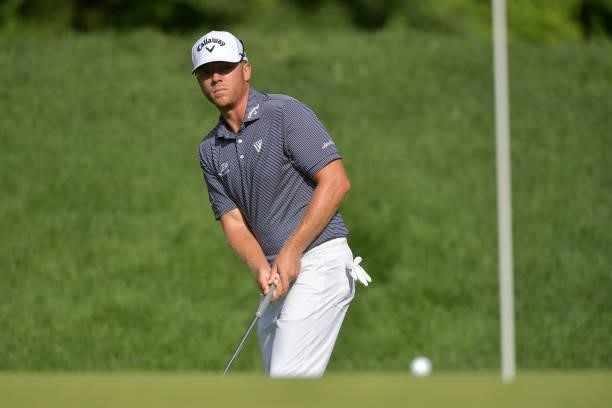 Talor Gooch of the United States plays a shot on the 14th green during the second round of the Travelers Championship at TPC River Highlands on June...