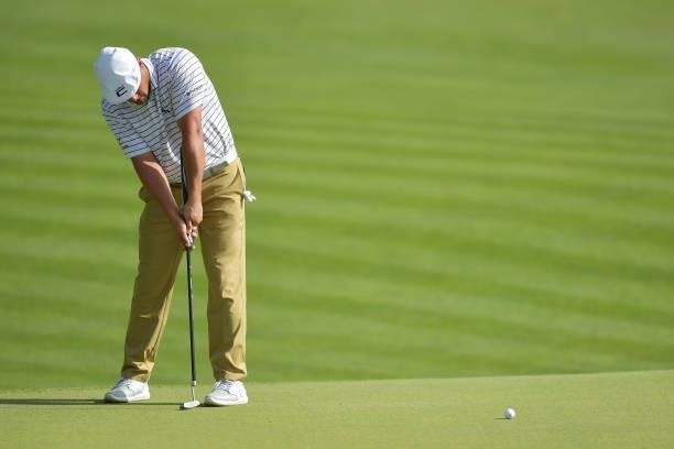 Bryson DeChambeau of the United States putts on the 15th green during the second round of the Travelers Championship at TPC River Highlands on June...