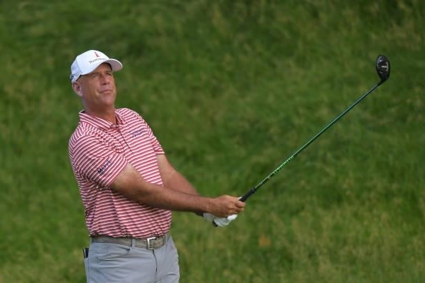 Stewart Cink of the United States plays his shot from the 15th tee during the second round of the Travelers Championship at TPC River Highlands on...