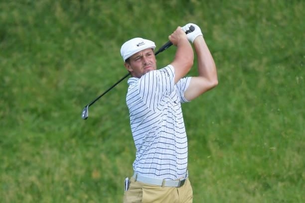 Bryson DeChambeau of the United States plays his shot from the 15th tee during the second round of the Travelers Championship at TPC River Highlands...