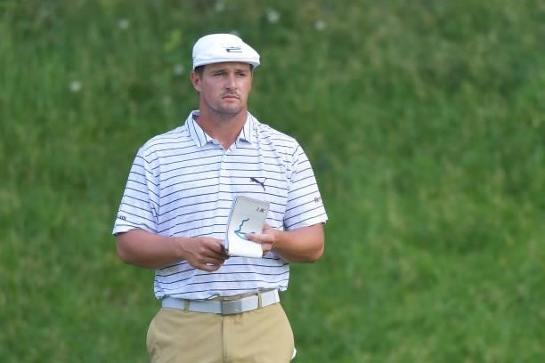 Bryson DeChambeau of the United States looks over his shot from the 15th tee during the second round of the Travelers Championship at TPC River...