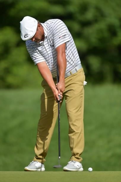 Bryson DeChambeau of the United States putts on the 15th green during the second round of the Travelers Championship at TPC River Highlands on June...