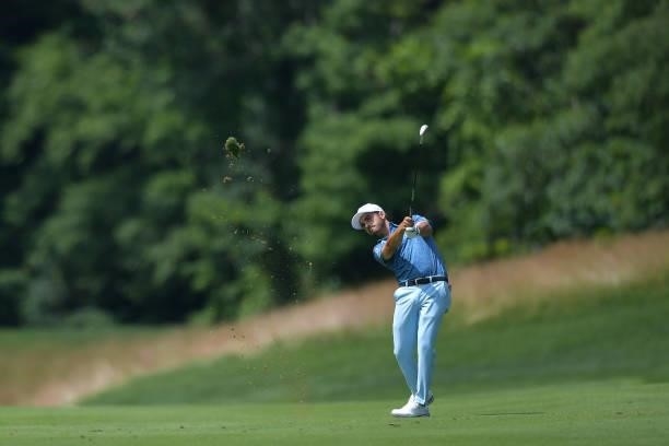 Abraham Ancer of Mexico plays a shot on the 12th hole during the second round of the Travelers Championship at TPC River Highlands on June 25, 2021...