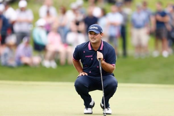 Patrick Reed of the United States looks over a putt on the fifth green during the second round of the Travelers Championship at TPC River Highlands...