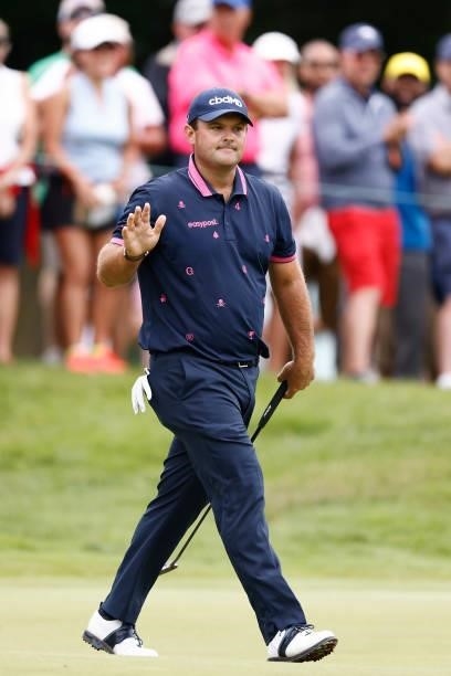 Patrick Reed of the United States reacts to his putt on the fifth green during the second round of the Travelers Championship at TPC River Highlands...