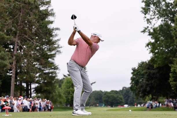 Stewart Cink of the United States plays his shot from the sixth tee during the second round of the Travelers Championship at TPC River Highlands on...
