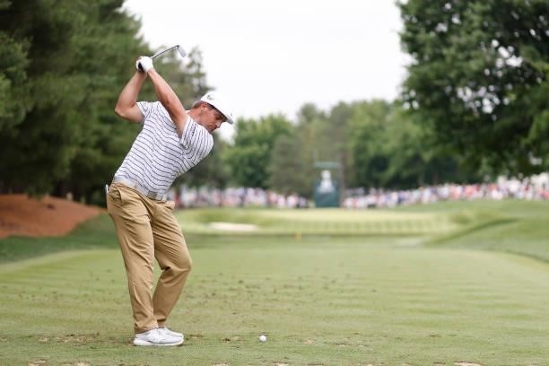 Bryson DeChambeau of the United States plays his shot from the eighth tee during the second round of the Travelers Championship at TPC River...