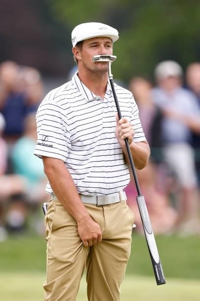 Bryson DeChambeau of the United States reacts to missing a putt on the fifth green during the second round of the Travelers Championship at TPC River...