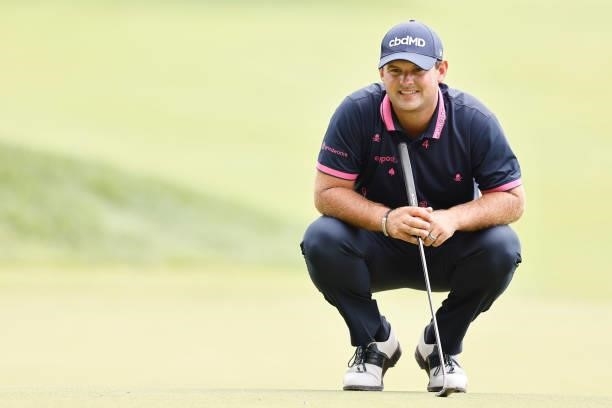 Patrick Reed of the United States looks over a putt on the seventh green during the second round of the Travelers Championship at TPC River Highlands...