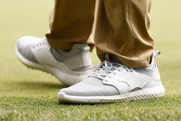 Detail of Bryson DeChambeau of the United States Puma shoes during the second round of the Travelers Championship at TPC River Highlands on June 25,...