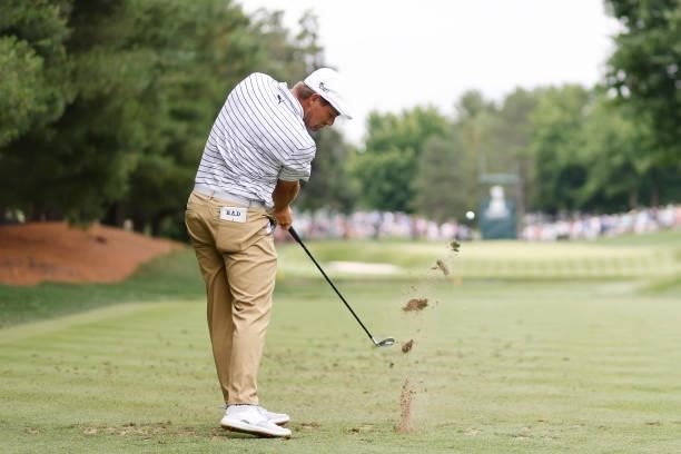 Bryson DeChambeau of the United States plays his shot from the eighth tee during the second round of the Travelers Championship at TPC River...