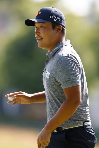Lee of Korea reacts to a putt on the seventh green during the second round of the Travelers Championship at TPC River Highlands on June 25, 2021 in...