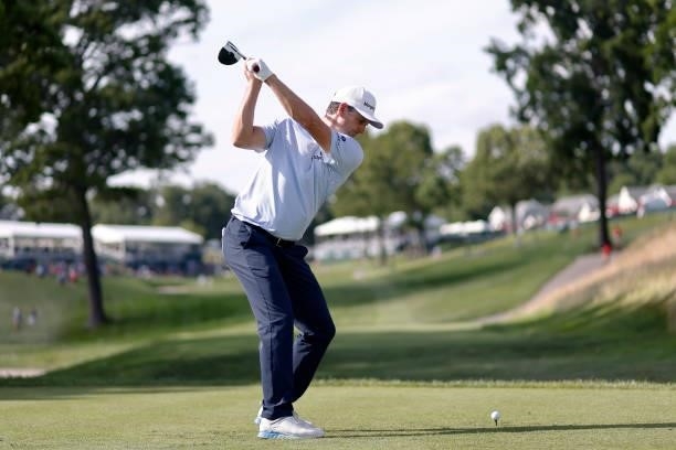 Justin Rose of England plays his shot from the 18th tee during the second round of the Travelers Championship at TPC River Highlands on June 25, 2021...