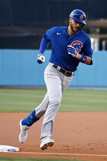 Kris Bryant of the Chicago Cubs rounds the bases after hitting a solo home run against the Los Angeles Dodgers during the first inning at Dodger...