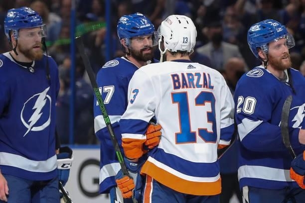 Mathew Barzal of the New York Islanders shakes hands with Alex Killorn of the Tampa Bay Lightning after the Lightning's 1-0 victory in Game Seven of...