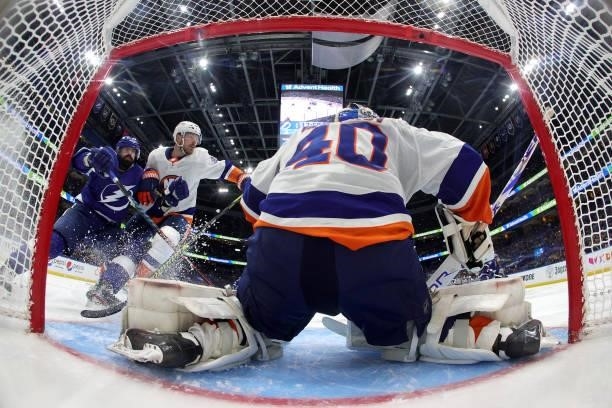 Semyon Varlamov of the New York Islanders tends net as Scott Mayfield defends Alex Killorn of the Tampa Bay Lightning in Game Seven of the NHL...