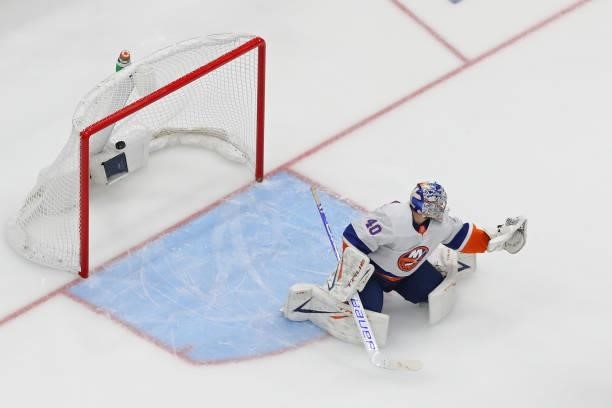 Semyon Varlamov of the New York Islanders allows a goal to Yanni Gourde of the Tampa Bay Lightning during the second period in Game Seven of the NHL...