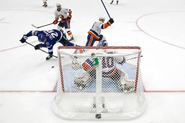 Blake Coleman of the Tampa Bay Lightning attempts a shot on Semyon Varlamov of the New York Islanders during the third period in Game Seven of the...