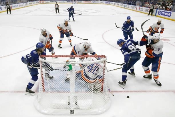 Semyon Varlamov of the New York Islanders tends net as Ryan Pulock defends Steven Stamkos of the Tampa Bay Lightning during the first period in Game...