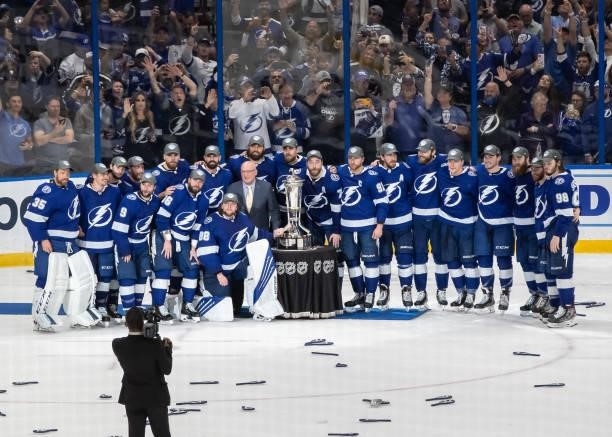 The Tampa Bay Lightning pose with the Prince of Wales Trophy after their 1-0 win against the New York Islanders in Game Seven of the NHL Stanley Cup...