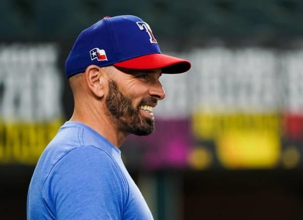 Chris Woodward of the Texas Rangers smiles during batting practice before the game against the Kansas City Royals at Globe Life Field on June 25,...