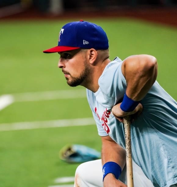 Nate Lowe of the Texas Rangers looks on during batting practice before the game against the Kansas City Royals at Globe Life Field on June 25, 2021...