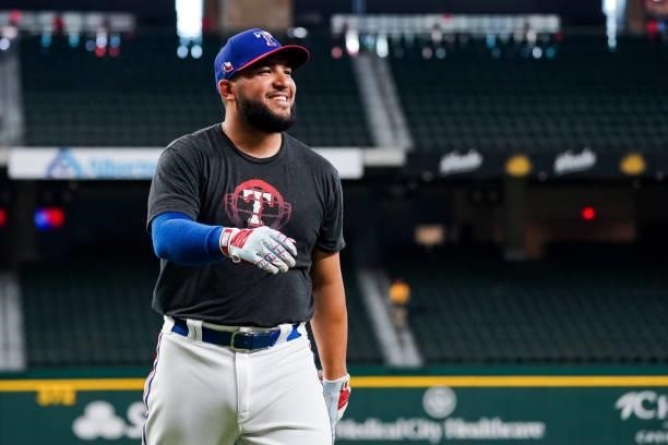 Jose Trevino of the Texas Rangers smiles during batting practice before the game against the Kansas City Royals at Globe Life Field on June 25, 2021...