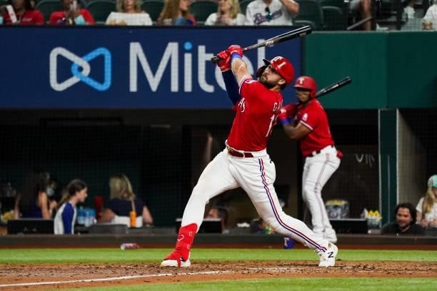 Joey Gallo of the Texas Rangers swings during the game against the Kansas City Royals at Globe Life Field on June 25, 2021 in Arlington, Texas.