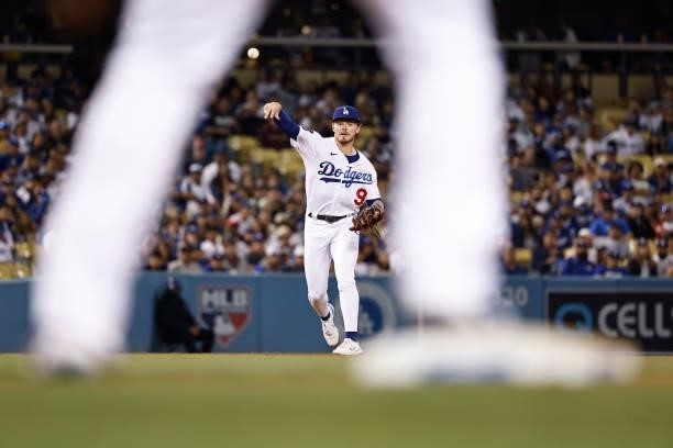 Gavin Lux of the Los Angeles Dodgers makes a throw to first base against the Chicago Cubs during the sixth inning at Dodger Stadium on June 25, 2021...